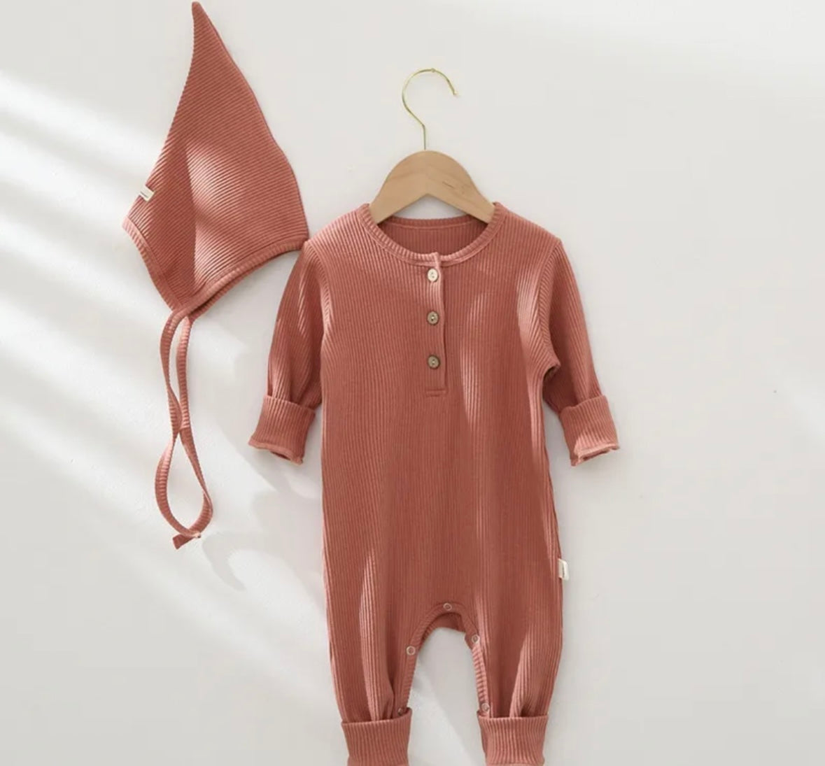 Baby sleep suit with hat